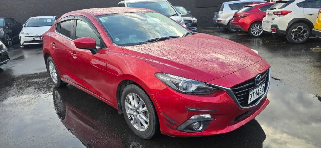 front side view of 2014 Mazda Axela