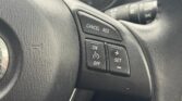 closeup view of steering wheel view of 2013 Mazda CX-5