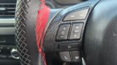 steering wheel closeup view of 2014 Mazda Axela