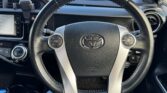 steering wheel view of 2016 Toyota Aqua