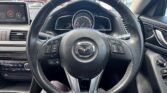 steering wheel view of 2014 Mazda Axela