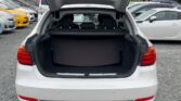 used 2014 BMW 320i open trunk view