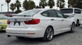 used 2014 BMW 320i back side view