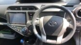 steering wheel view of 2014 Toyota Aqua