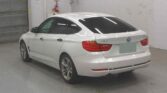 used 2014 BMW 320i back side view