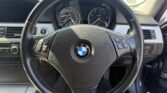 steering wheel view of 2011 BMW 320i