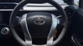 steering wheel view of 2015 Toyota Aqua