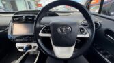 steering wheel view of 2016 Toyota Prius 5D