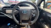 steering wheel view of 2017 Toyota Aqua