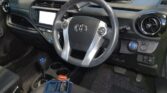 steering wheel view of 2017 Toyota Aqua