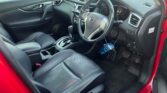 front door open view of 2014 Nissan X-Trail