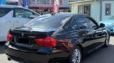 used 2011 BMW 320i back side view