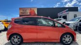 full side view of 2011 Honda Fit RS