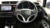 steering wheel view of 2014 Honda Fit