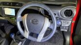 steering wheel view of 2014 Toyota Aqua