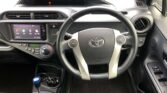 steering wheel view of 2014 Toyota Aqua