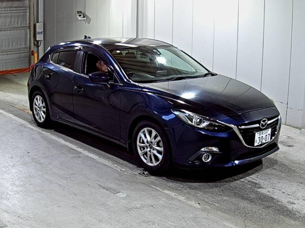 side view of 2015 Mazda Axela