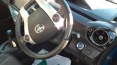 steering wheel view of 2015 Toyota Aqua