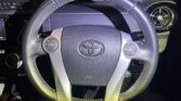 steering wheel view of 2016 Toyota Aqua