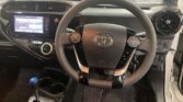 steering wheel view of 2018 Toyota Aqua