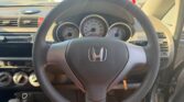 steering wheel view of 2005 Honda Fit