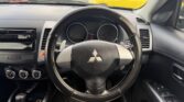 steering wheel view of 2010 Mitsubishi Outlander