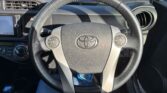 steering wheel view of 2013 Toyota Aqua