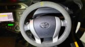 steering wheel view of 2014 Toyota Aqua