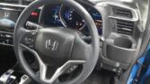 steering wheel view of 2015 Honda Fit