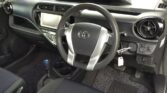 steering wheel view of 2015 Toyota Aqua