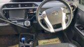 steering wheel view of 2016 Toyota Aqua