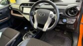 steering wheel view of 2015 Toyota Aqua